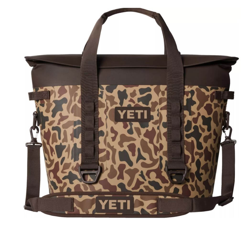 YETI Hopper M30 2.0 Soft Cooler in camouflage design, perfect for outdoor adventures and keeping beverages cold.